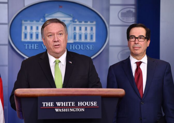 US Secretary of State Mike Pompeo and Treasury Secretary Steven Mnuchin announce new sanctions on Iran, at the White House in Washington, DC, on January 10, 2020. (Photo by Nicholas Kamm / AFP) (Photo by NICHOLAS KAMM/AFP via Getty Images)