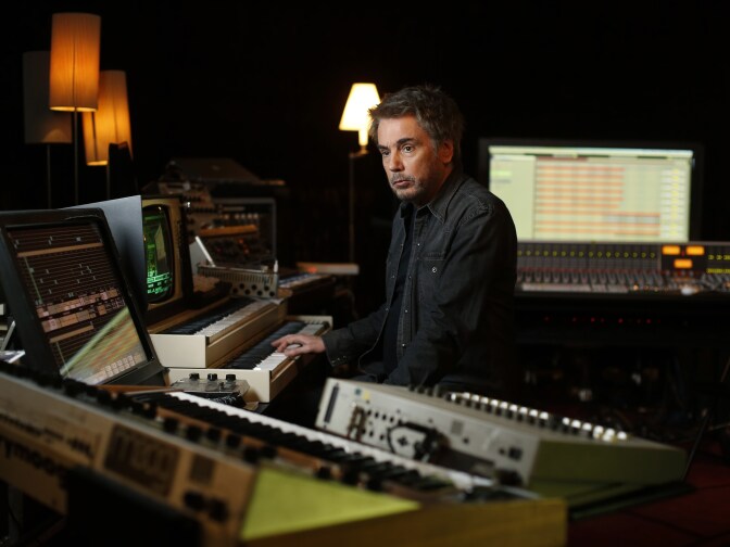 French composer, performer and music producer Jean-Michel Jarre poses at his recording studio in Bougival, west of Paris, on September 30, 2015. AFP PHOTO / THOMAS SAMSON        (Photo credit should read THOMAS SAMSON/AFP/Getty Images)