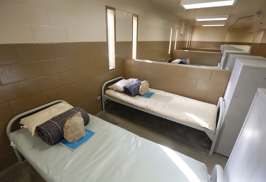 Beds are seen at one of the housing units of at the Folsom Women's Facility in Folsom, Calif., Wednesday, Jan. 16, 2013.   The former community correctional facility will reopen next week to house about 400 female inmates as part of a reorganization with the California prison system.   Ceremonies dedicating the facility were held Wednesday followed by tours for  dignitaries and the media.(AP Photo/Rich Pedroncelli)