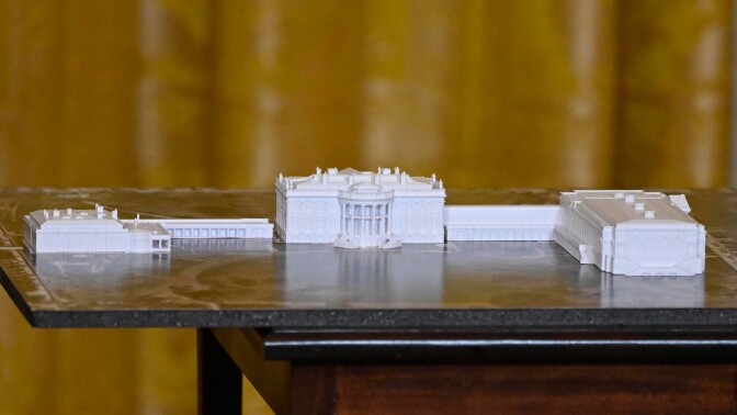 A model of the White House sits on a table.