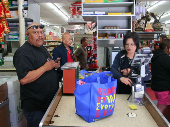 Even in a small market like Grocery Warehouse, LA sanitation workers are ready to talk to people in 5 languages, a sign of the city's diversity. 