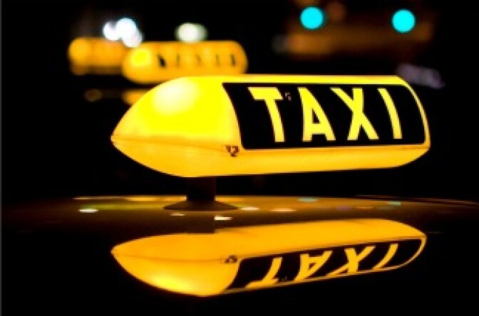 File photo of a taxi sign. 