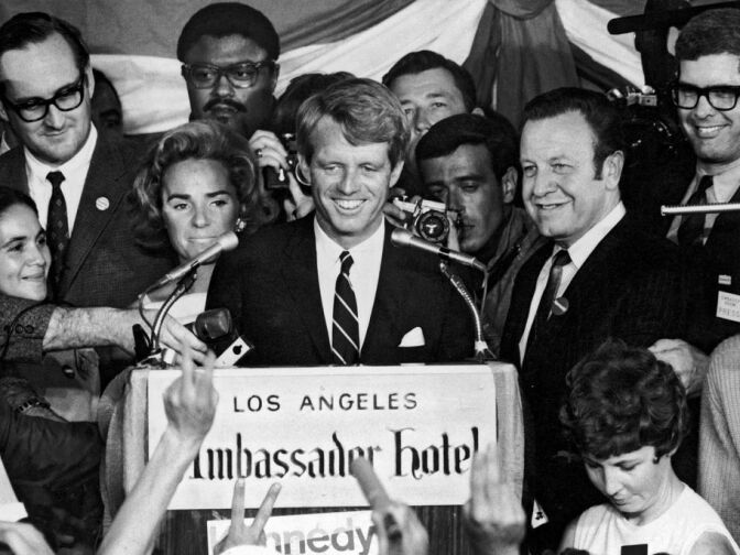 Robert F. Kennedy's speech at the Ambassador Hotel. Sandi Gibbons the woman in the white dress  on the bottom right.
