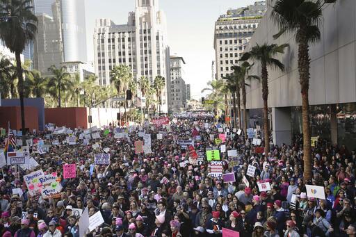 Protesters fill the streets of downtown Los Angeles as they gather for the Women's March against President Donald Trump Saturday, Jan. 21, 2017.  The march is being held in solidarity with similar events taking place in Washington and around the nation. (AP Photo/Jae C. Hong)