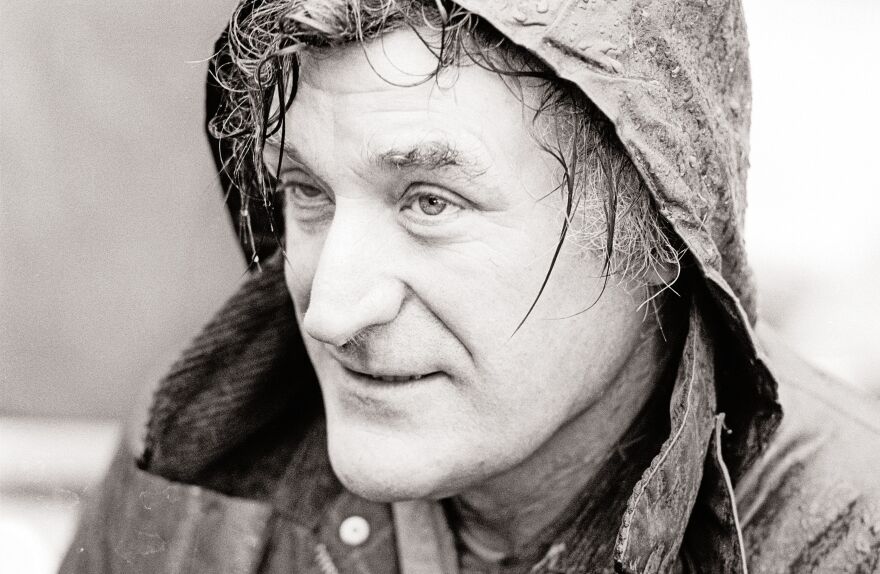 Poet Ted Hughes met Sylvia Plath 1956. "They were both geniuses, says biographer Jonathan Bate. Hughes is shown above on the first day of trout fishing season in April 1986.