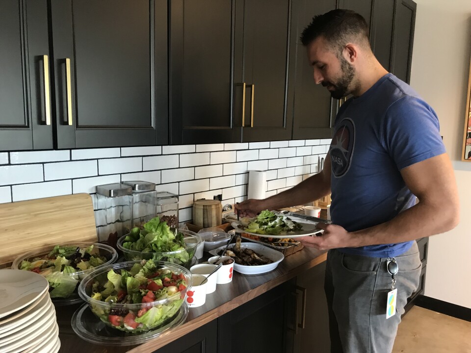 A Tender Greens office employee grabs lunch in their downtown Los Angeles headquarters, March 28, 2018. 