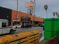 Glimpse of Canter's Deli on Fairfax from across the street where there are signs of construction 