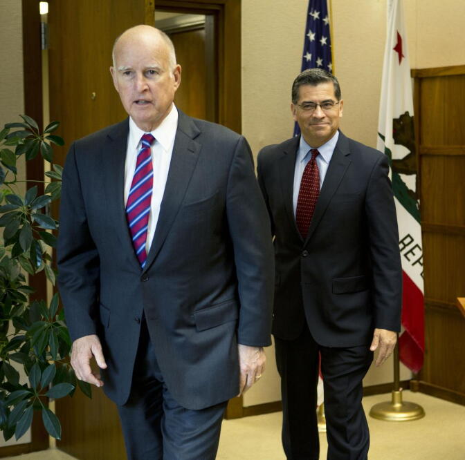 Gov. Jerry Brown with Rep. Xavier Becerra (D-Los Angeles), his choice for California attorney general.