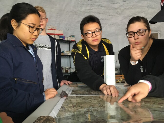 Crew members Jingjit (from left), Joseph Quaas, Caleb Li and Victoria LaBarre review the team's next excursion.