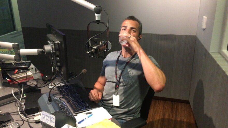 A Martinez downs some recycled wastewater.