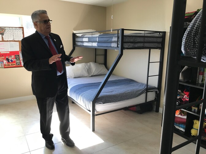 Illumination Foundation CEO Paul Leon stands in a newly opened homeless shelter for families in Stanton. 