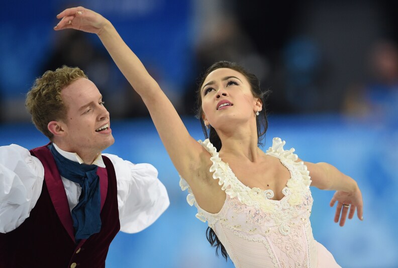 US Evan Bates and US Madison Chock perform in the Figure Skating Ice Dance Free Dance at the Iceberg Skating Palace during the Sochi Winter Olympics on February 17, 2014.
