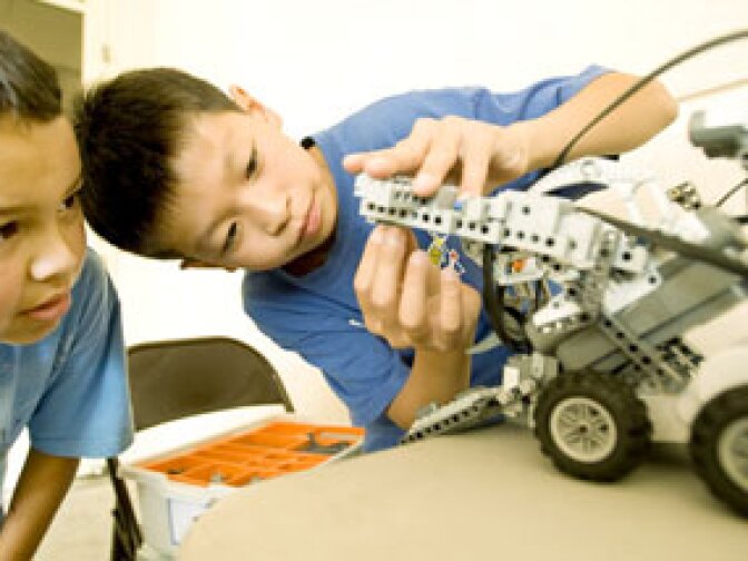 Students work on their robot, "Viper," at the 2008 Robot Rally.