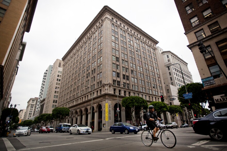 Crews have begun chipping away at the green paint outlining bicycle lanes on Spring Street between Cesar Chavez and 9th Street. The original green lanes were part of the effort to increase ridership, but film productions found the color distracting and asked the city to change it.