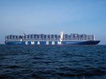 The ultra-large cargo ship CMA CGM will stop at the Port of Los Angeles on Dec. 26, becoming the first ship of its size to dock in North America. More will come as large ports like Los Angeles and Long Beach have been remodeling wharves and channels to accommodate such big ships.