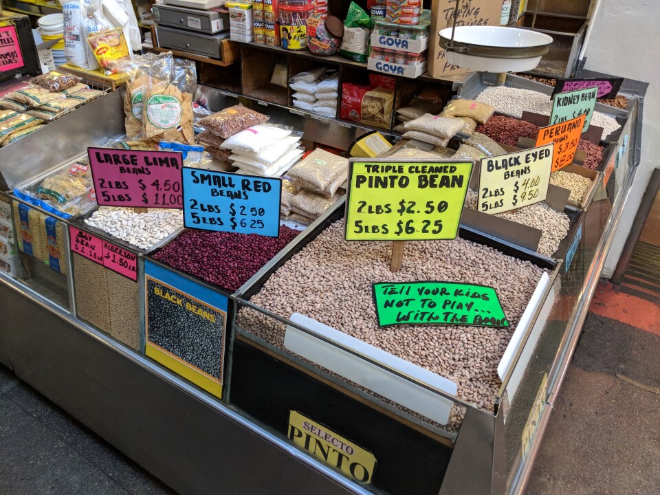 A selection of dried beans for sale at Chiles Secos, a Latino grocery stall at Grand Central Market.