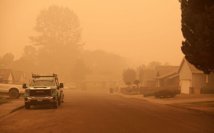 An orange smoke-filled sky is seen above Molalla, Oregon, on September 10, 2020, as fires burn nearby. - California firefighters battled the state's largest ever inferno Thursday, as tens of thousands of people fled blazes up and down the US West Coast and officials warned the death toll could shoot up in coming days. At least eight people have been confirmed dead in the past 24 hours across California, Oregon and Washington, but officials say some areas are still impossible to reach, meaning the number is likely to rise. (Photo by Deborah BLOOM / AFP) (Photo by DEBORAH BLOOM/AFP via Getty Images)