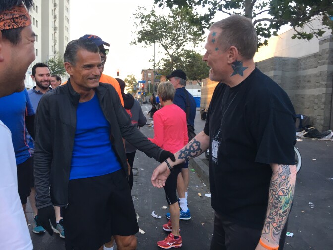 Judge Craig J. Mitchell (second from left) meets with the Skid Row Running Club in downtown Los Angeles.
