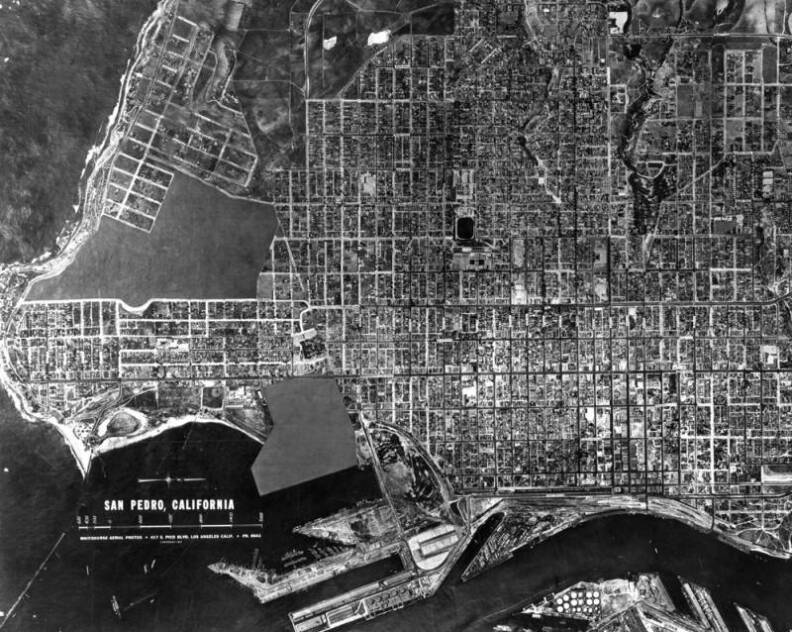 Aerial view of San Pedro Point Fermin area. Fort MacArthur Reservation is blacked out by censors.