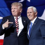 Republican presidential candidate Donald Trump, points toward Republican vice presidential candidate Indiana Gov. Mike Pence after Pence's acceptance speech during the third day session of the Republican National Convention in Cleveland, Wednesday, July 20, 2016. (AP Photo/Mary Altaffer)