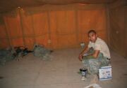 Jesus Medina at an Army base in Kuwait in 2005, waiting to deploy to Mosul, Iraq.