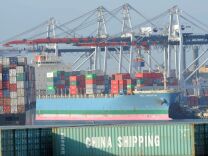 A container is off loaded from a ship at the Port of Los Angeles in San Pedro, California on May 12, 2010.