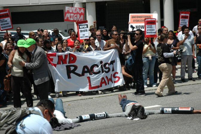 Betty Hung (far left in green cap), policy director for the Asian Pacific American Legal Center, said there are "more immigrants coming from Asia to California than from anywhere else in the world.” Thousands of people in favor of immigration rights are expected to march on Washington, D.C. Wednesday. 