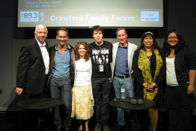 Steve Julian with the evening's panelists