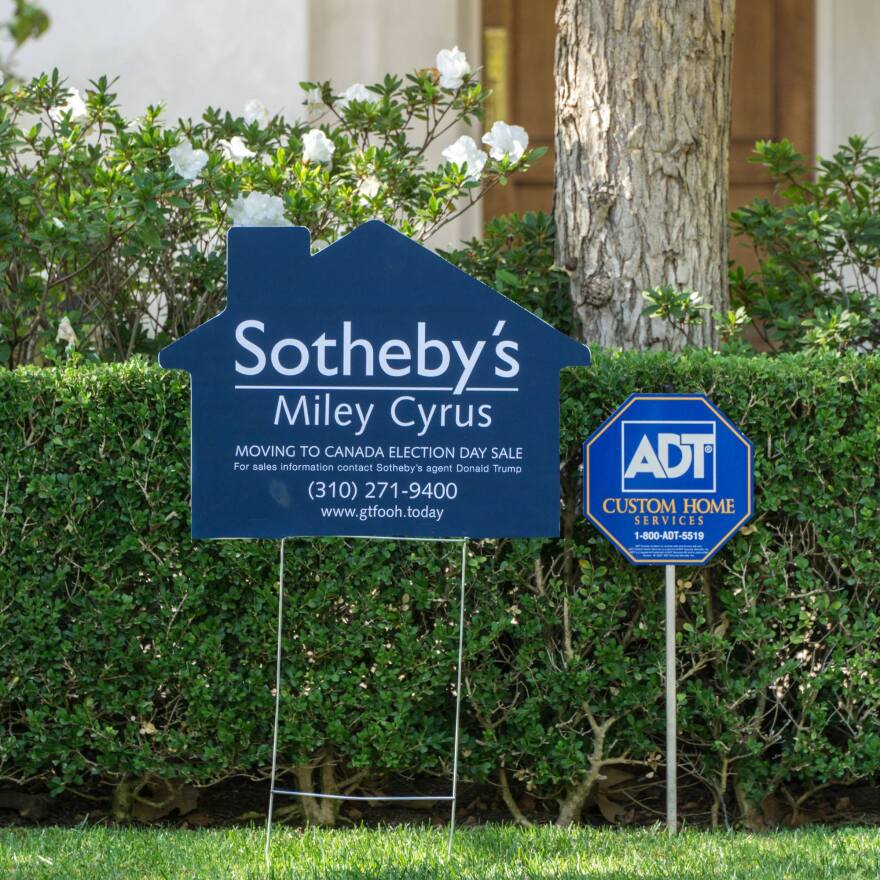 A fake home for sale sign created by conservative street artist Sabo.