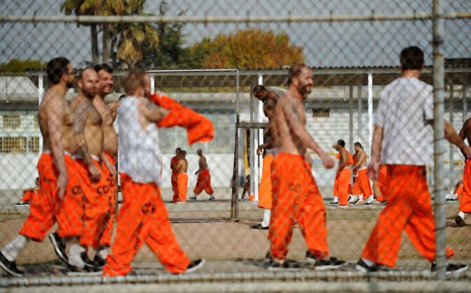 File photo: Inmates exercise at Chino State Prison in 2010.