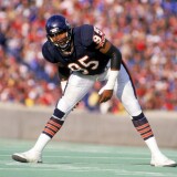 CHICAGO - NOVEMBER:  Defensive end Richard Dent #95 of the Chicago Bears stretches during game in November of 1987 at Soldier Field in Chicago, Illinois.  (Photo by Jonathan Daniel/Getty Images) *** Local Caption *** Richard Dent