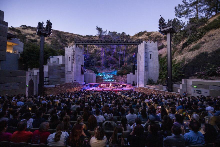 Image of a crowd inside the Ford Theatre at dusk.