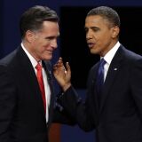 Republican presidential nominee Mitt Romney and President Obama talk after the first presidential debate at the University of Denver on Wednesday, Oct. 3, 2012.