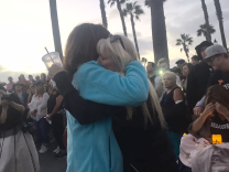 Hundreds of people joined a vigil in Huntington Beach to remember the 58 victims killed in a shooting in Las Vegas. Sunday, October 8th 2017. (Libby Denkmann/KPCC)
