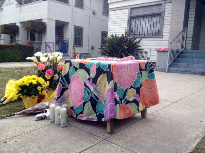 A small memorial set up at the house of two USC graduate students from China who were shot and killed, April 11, 2012.