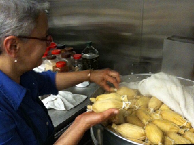 Patricia Zarate, manager of Homegirl Cafe, readies a batch of tamales. The L.A. restaurant is set to sell artisan tamales at a new LAX restaurant in a few months.