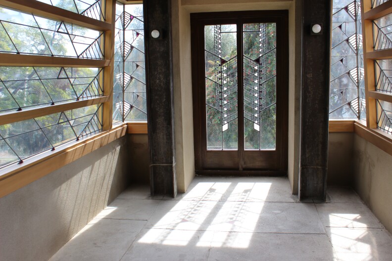 Though primarily an architect, Frank Lloyd Wright also designed furniture, graphic art, and stained glass as seen in the image above. 