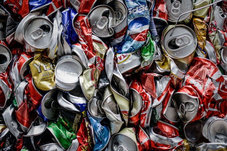 Aluminium cans are seen compressed before recycling in Hong Kong on February 20, 2013. Activists have claimed for years that Hong Kong lags behind the rest of the world on environmental issues ranging from recycling to lanes for cyclists.