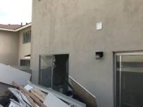 An explosion in an apartment building in Torrance Sunday left four people injured and two residential units significantly damaged. 