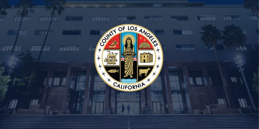 The logo of Los Angeles County is superimposed over an image of the main administration building faded in the background.