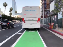 A video from cyclist Matthew Vitale shows a line of idling charter buses blocking the new bike lane on Figueroa Street. The LA Department of Transportation is doing outreach with local businesses and the LAPD has upped enforcement to try to clear vehicles from the lane.