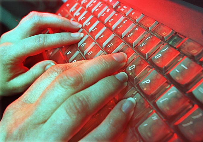 388813 01: A photo illustration depicts a person typing May 4, 2001 in Denver, CO. National Academy of Sciences estimates that musculoskeletal disorders such as carpal-tunnel syndrome, tendinitis, and lower back pain cost the nation $45 billion to $54 billion in compensation, lost wages, and lower productivity each year. (Photo by Michael Smith/Newsmakers)