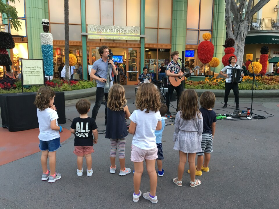 The band Streetlight Cadence performs for a group of kids at Downtown Disney, Anaheim. Credit/Beidi Zhang
