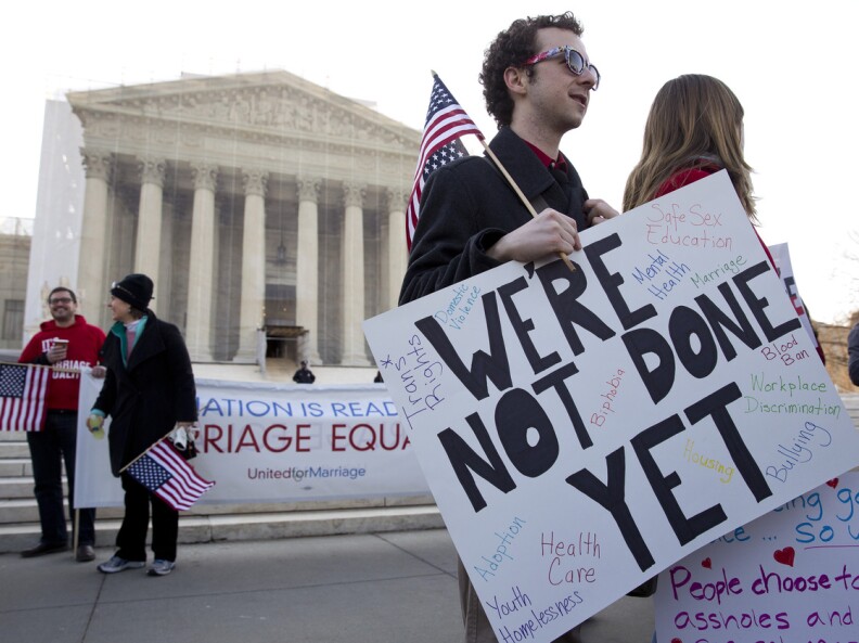 The Supreme Court on Wednesday heard arguments over the Defense of Marriage Act, which denies federal benefits to gay couples legally married under the laws of their state.