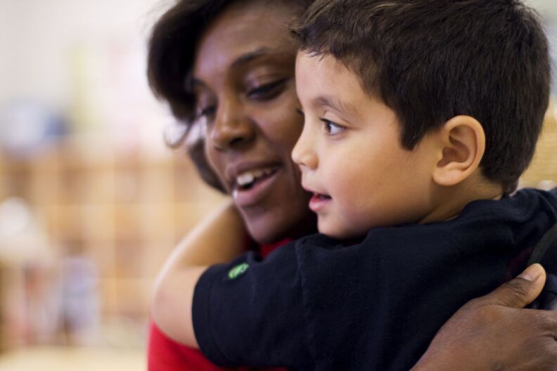 “Attuned” care-giving is promoted as a critical way to impact healthy brain development in 0-5 age group. Here a teacher at LAUP Preschool "Un Mundo de Amigos" in the City of Long Beach, gives nurturing attention to child. Some experts believe this is critical for helping a child learn emotional control rather than only focusing on cognitive skills. 
