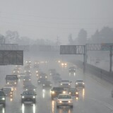 Commuters drive under heavy rainfall in Los Angeles, California on March 21, 2018
A slow-moving storm, billed as an "atmospheric river" began unleashing rain across southern California. Mandatory evacuations have been ordered by officials in Santa Barbara, Ventura and Los Angeles counties. / AFP PHOTO / Frederic J. Brown        (Photo credit should read FREDERIC J. BROWN/AFP/Getty Images)
