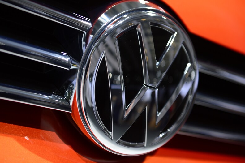 Logo of German car maker Volkswagen (VW) is pictured on a VW car during the shareholders' annual general meeting of VW in Hanover, central Germany, on May 5, 2015. German auto giant Volkswagen held its first ordinary shareholders' annual general meeting since a bitter power struggle at the top of the company led to the resignation of VW patriarch Ferdinand Piech as supervisory board head. AFP PHOTO / JOHN MACDOUGALL        (Photo credit should read JOHN MACDOUGALL/AFP/Getty Images)