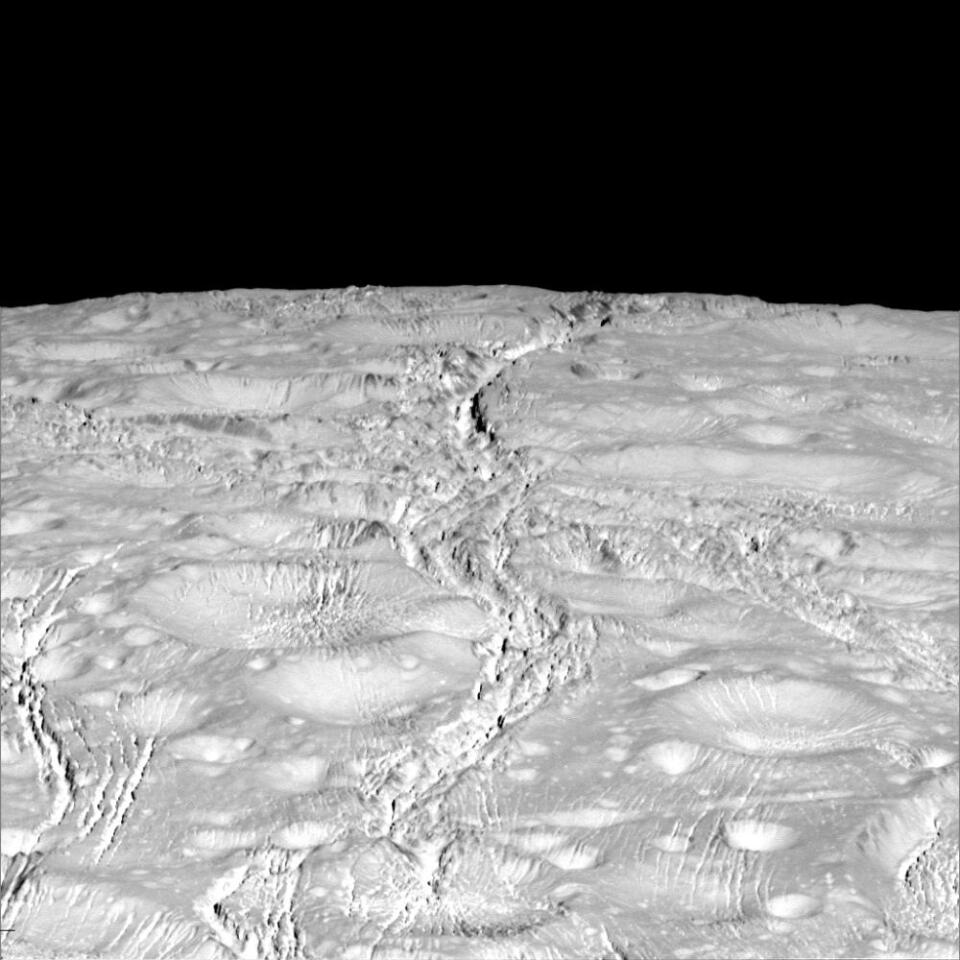 Unlike the South pole of Enceladus, the North pole is marked with impacts from meteoroids.