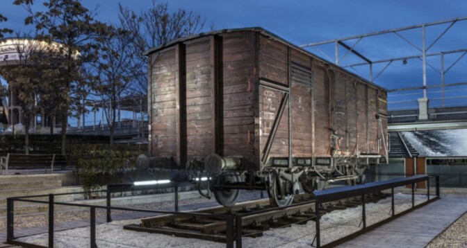 An original German freight train car used to transport Jews to concentration camps is included in  "Auschwitz. Not Long Ago. Not Far Away," an exhibition at the Museum of Jewish Heritage in New York City. 