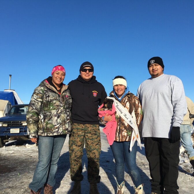 Anderson Gould, a Marine veteran and resident of San Clemente, CA, second from left, at the Standing Rock site in North Dakota where he joined the encampment with other veterans.